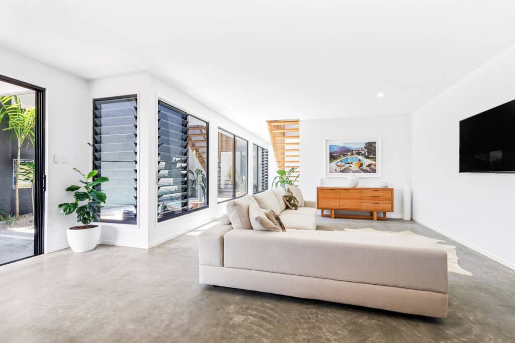 Covered alfresco with louvre windows and outdoor lounge