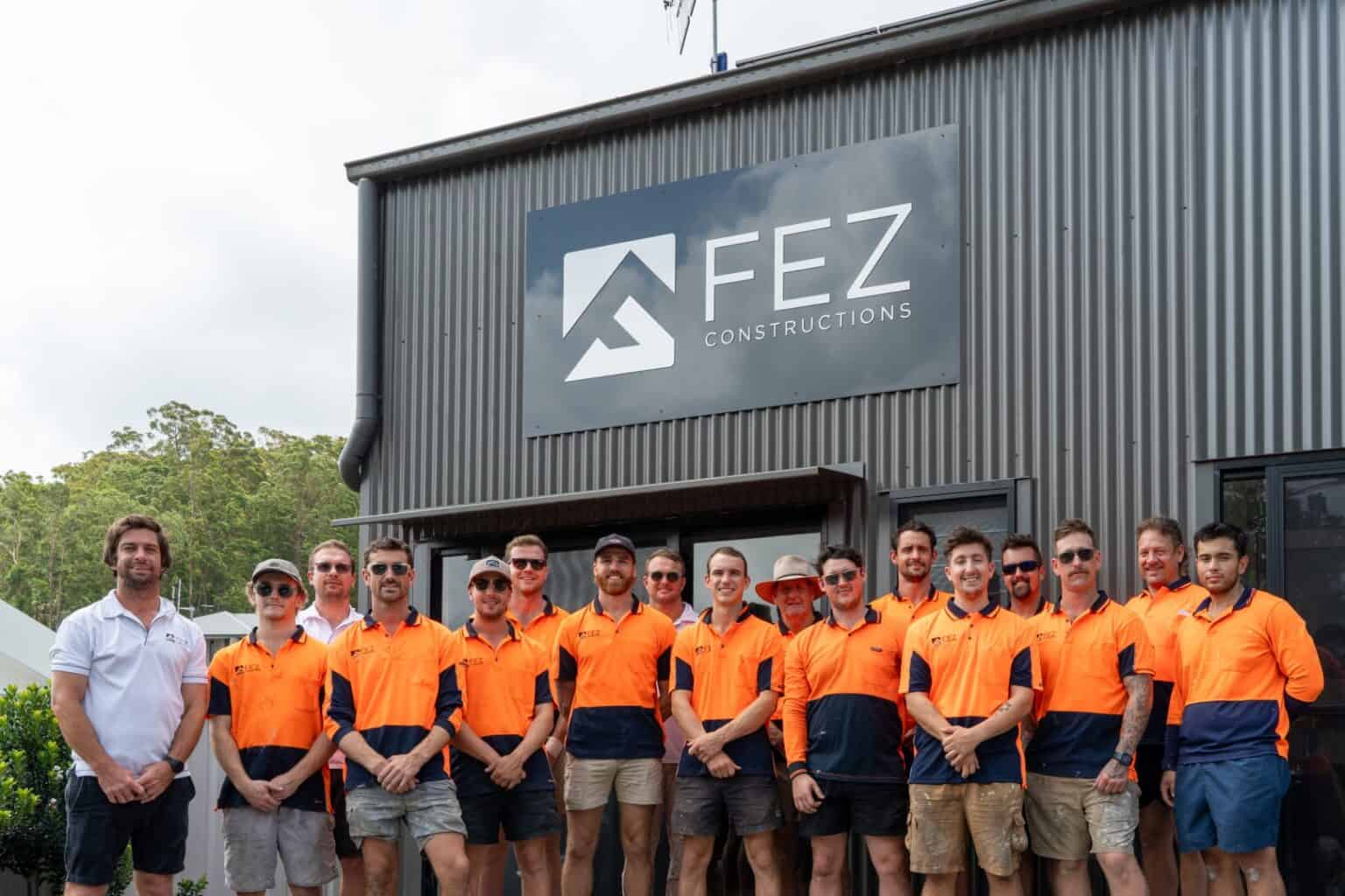 The FEZ Constructions team in front of their workshop